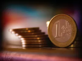 Descubre la economía detrás de la moneda de un euro con una cruz